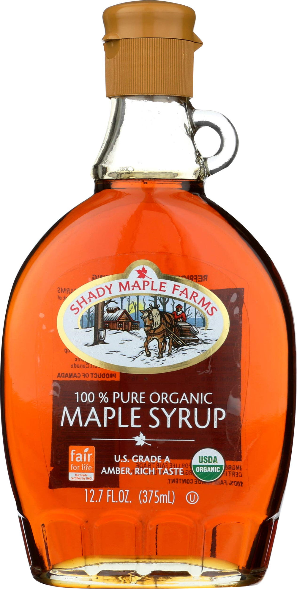 Shady Maple Farm maple syrup bottle closeup showing rich amber color
