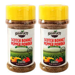 Shavuot Scotch Bonnet pepper powder being sprinkled to add vibrant color and aroma
