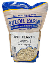 Shiloh Farms Organic Rye Flakes in a 15oz package ready to cook, showcasing a wholesome breakfast option.