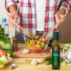 Siberian Tiger Naturals pine nut oil drizzle over a fresh salad