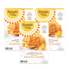Simple Mills Farmhouse Cheddar almond flour crackers 3-pack shown with cheese platter