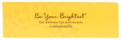 Pouring batter from Simple Mills Cocoa Pancake Waffle Mix for fluffy, tasty pancakes.