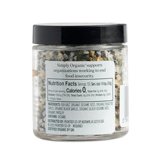 Close-up of Simply Organic Black Garlic Finishing Salt crystals for savory flavor boost.