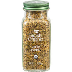 Simply Organic Garlic Pepper bottle pour enhances savory dishes with a zesty aroma.
