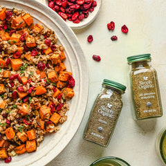 Simply Organic seasoning being dispensed from a jar for quick flavor boosts