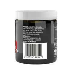 Spoonful of Simply Organic Vanilla Bean Paste showing creamy texture and aroma