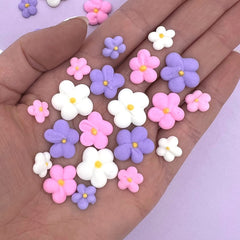 Simply Sucré Royal Icing Blossoms on cake show edible decorations for desserts.
