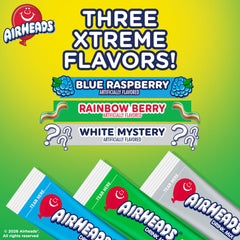SINGLES TO GO Airheads Xtreme Blue Raspberry dissolving in water.