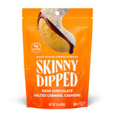 SkinnyDipped dark chocolate salted caramel cashews on bag front, gluten-free and protein-rich.