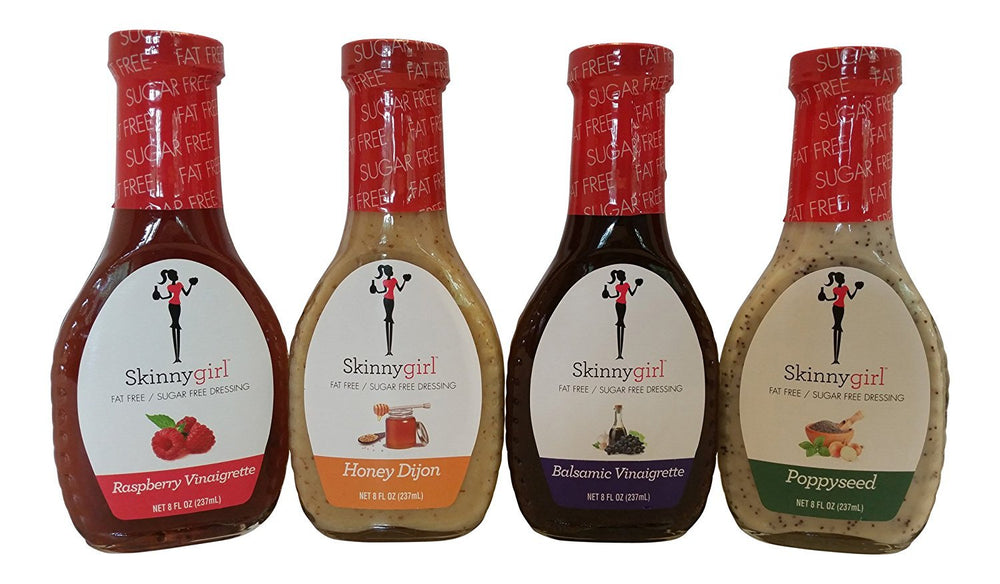 Skinnygirl Balsamic Vinaigrette bottle on fresh greens, a low sugar salad option