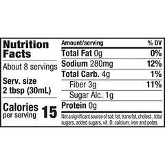 Skinnygirl chipotle ranch fat-free dressing pouring over a fresh salad