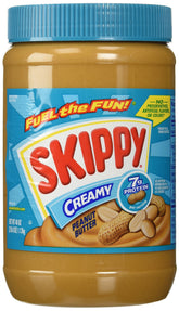 SKIPPY Creamy Peanut Butter jar on a kitchen counter for quick protein-rich snacking