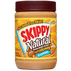 SKIPPY Natural Creamy Peanut Butter Spread with Honey jar offers smooth texture for sandwiches