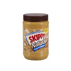 SKIPPY Natural SUPER CHUNK peanut butter jar on a kitchen counter for quick snacking.