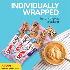 A bite shot of SKIPPY wafer bar with creamy peanut butter.