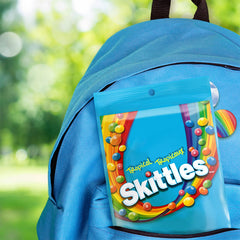 Skittles Tropical strawberry star fruit flavor close-up for tasting
