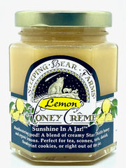 Sleeping Bear Farms Lemon Crème Honey jar close-up showing creamy texture and golden color.