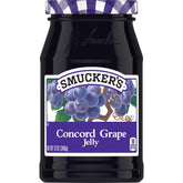 Smucker's Concord Grape Jelly jar ready to spread on toast, a timeless breakfast staple.