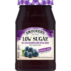 Smucker's Low Sugar Concord Grape Jelly 3-pack jars on shelf for easy breakfasts.