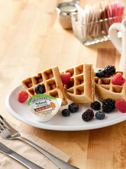 Non-GMO Smucker's syrup cups without artificial colors or dyes.
