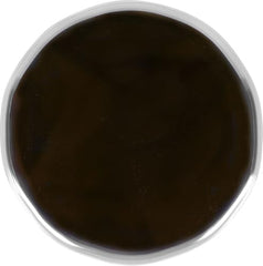 Smucker's Simple Delight hot fudge topping in a glass jar ready to pour