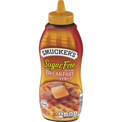 Pouring Smucker's Sugar Free Syrup over pancakes for a low-calorie breakfast option