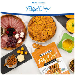Snack Factory Cheddar Pretzel Crisps on a charcuterie board for grazing