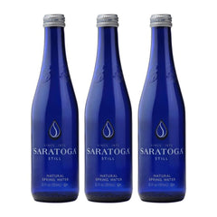 Snack Mass Saratoga Still Water in a glass bottle trio for elegant everyday hydration