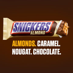 Close-up of roasted almonds in a Snickers Almond bar for a crunchy bite.