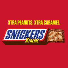 Snickers Xtreme bar on a surface with chocolate coating