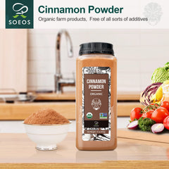 Soeos Organic Cinnamon Powder spoon close-up reveals fine grind and warm hue.