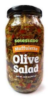 Solestado Muffuletta Olive Salad jar shows glossy olive mix for antipasto tables.