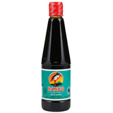 Soy Bango Kecap Manis bottle pouring a thick caramel glaze for meats and stir-fries.