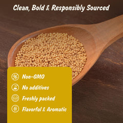 Spice Profile yellow mustard seeds being poured for a recipe