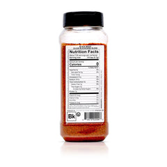 Spiceology Black Magic Cajun Blackening Seasoning sprinkled on chicken for savory flavor.
