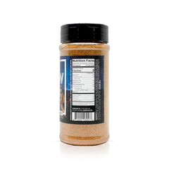 Close-up of Spiceology Cowboy Butter seasoning shaker with garlic and paprika aromas.