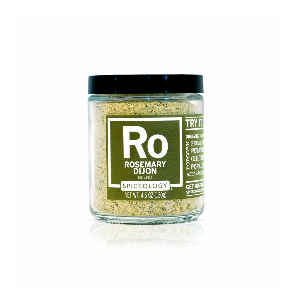 Spiceology Rosemary Dijon blend bottle pouring for rich, aromatic roasts and sauces.