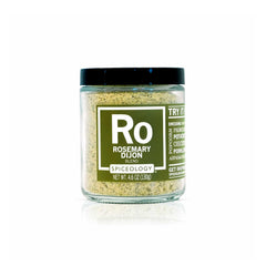 Spiceology Rosemary Dijon blend bottle pouring for rich, aromatic roasts and sauces.