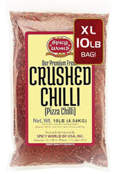 Spicy World crushed red pepper flakes bulk pack front view adds bold flavor to pizzas.