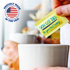 Original flavor Splenda packets on fruit or cereal for light sweetness.