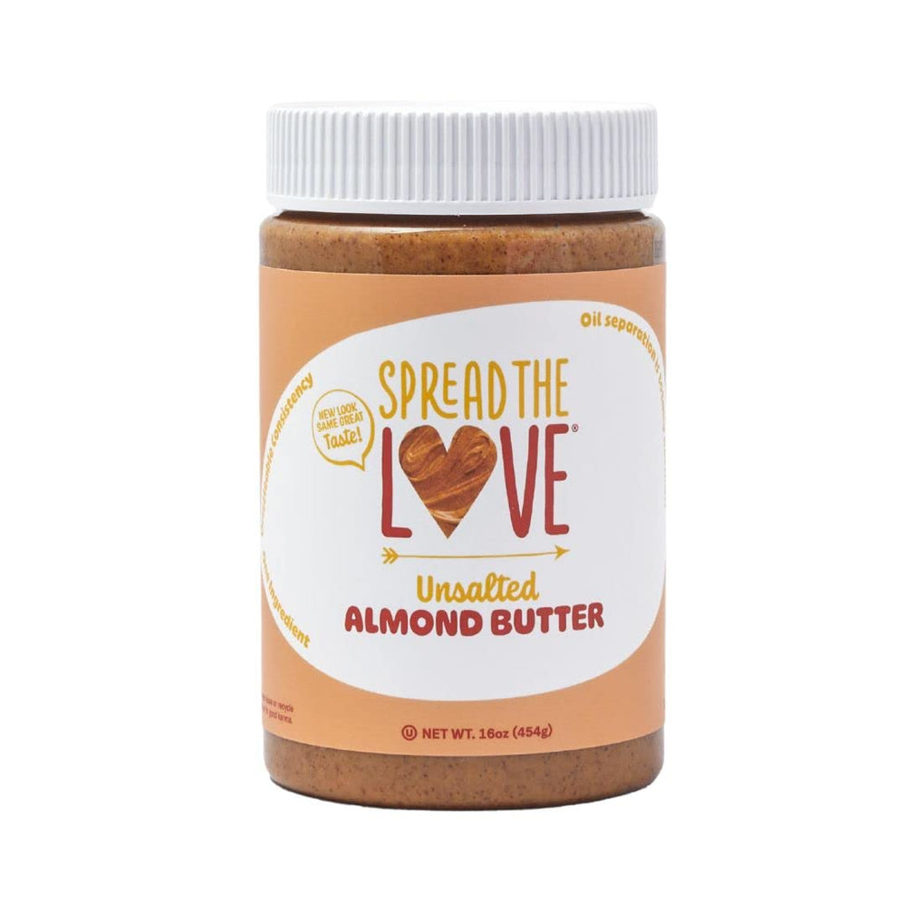 Spread The Love almond butter jar closeup showing creamy texture and clean ingredients.