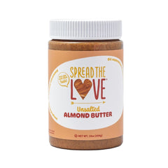 Spread The Love almond butter jar closeup showing creamy texture and clean ingredients.
