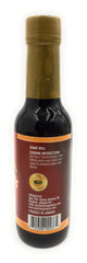 Spur Tree Jamaican Browning Sauce bottle close-up shows authentic color enhancer