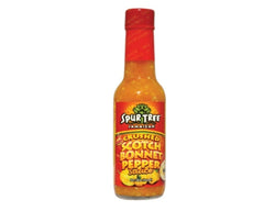 ACT Spur Tree Jamaican crushed Scotch Bonnet pepper sauce bottle adds fiery Jamaican heat and flavor to meals.