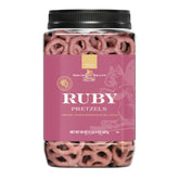 Squirrel Brand Ruby Cacao Pretzel Twists in a resealable jar with premium ruby cacao coating.