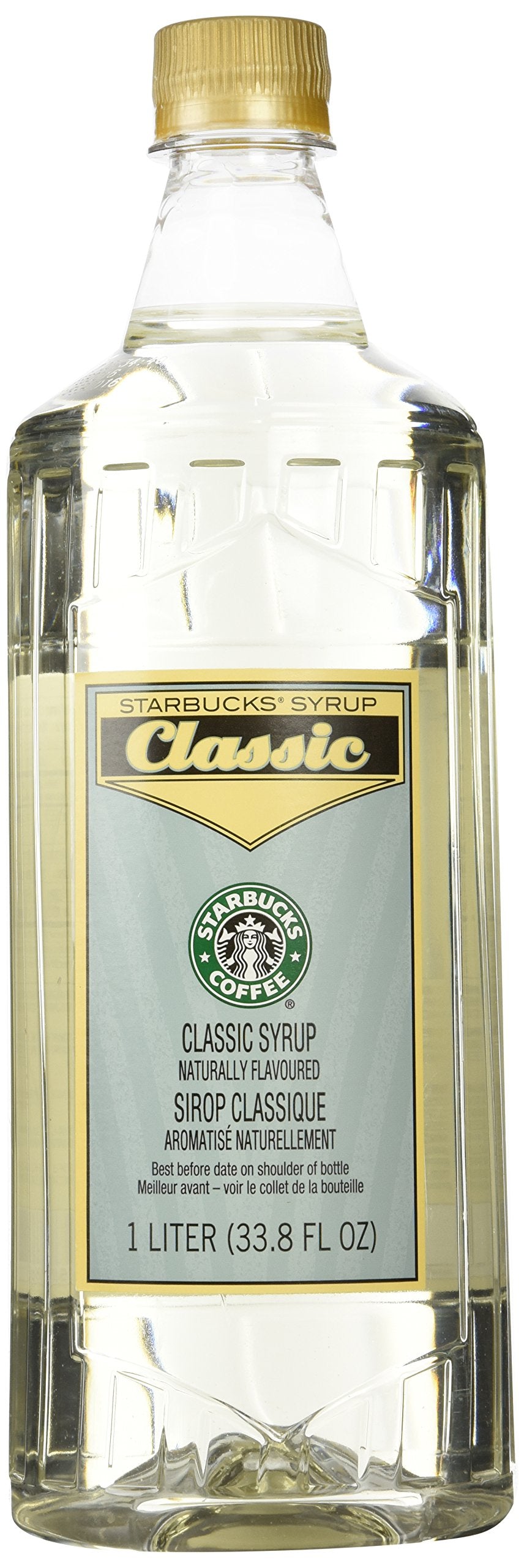 Starbucks Classic Syrup bottle on kitchen counter for at-home drinks.