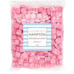Starburst all-pink strawberry chews close-up showing juicy pink candies.