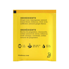 Stash Lemon Ginger Vitality tea bags close-up showing natural ingredients.