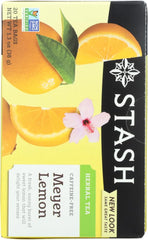Stash Meyer Lemon tea packets arranged beside a cozy mug.