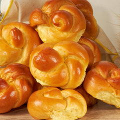 Stern's Bakery challah rolls in a 2-13 oz pack ready to serve at gatherings.